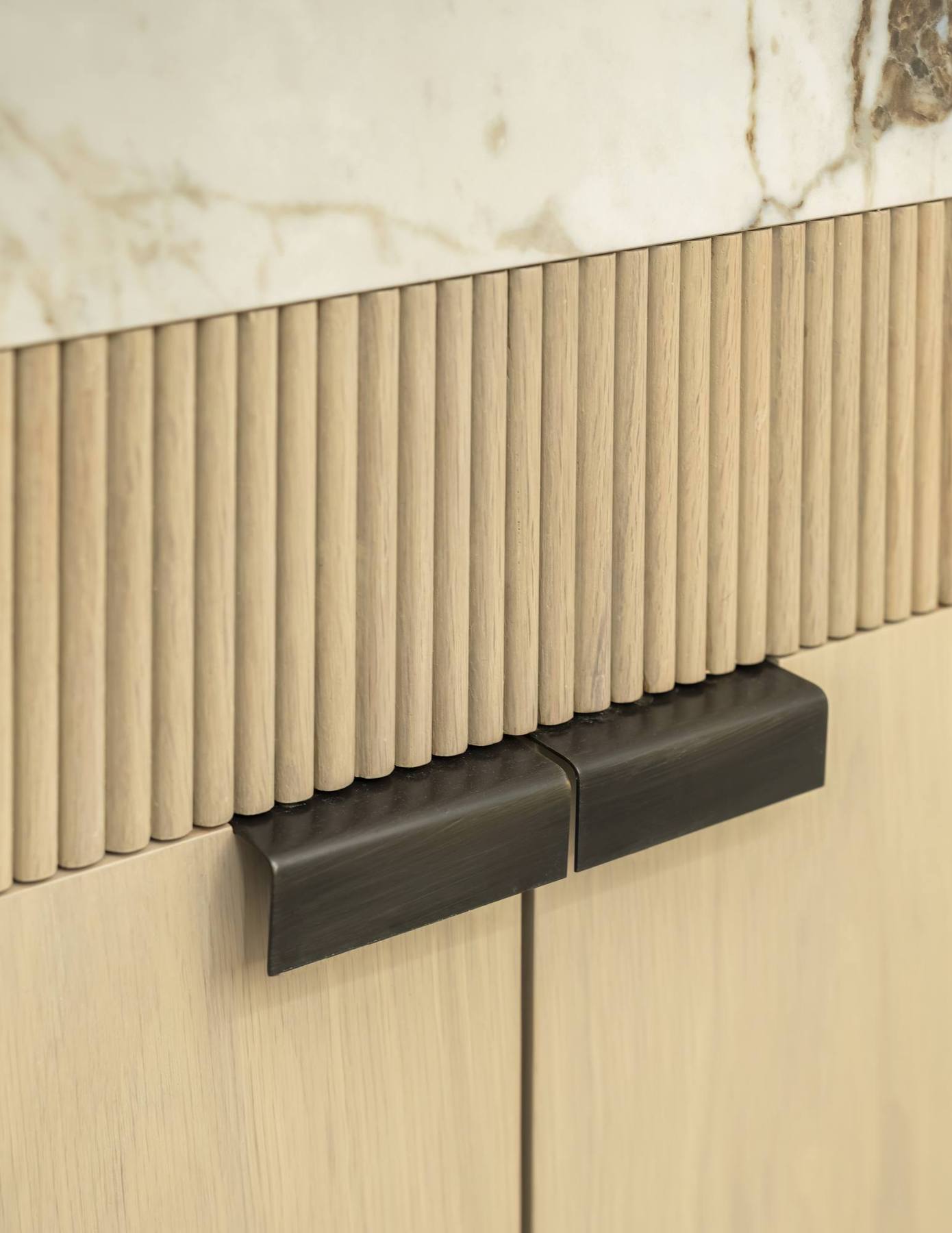 Fluted joinery and marble detail