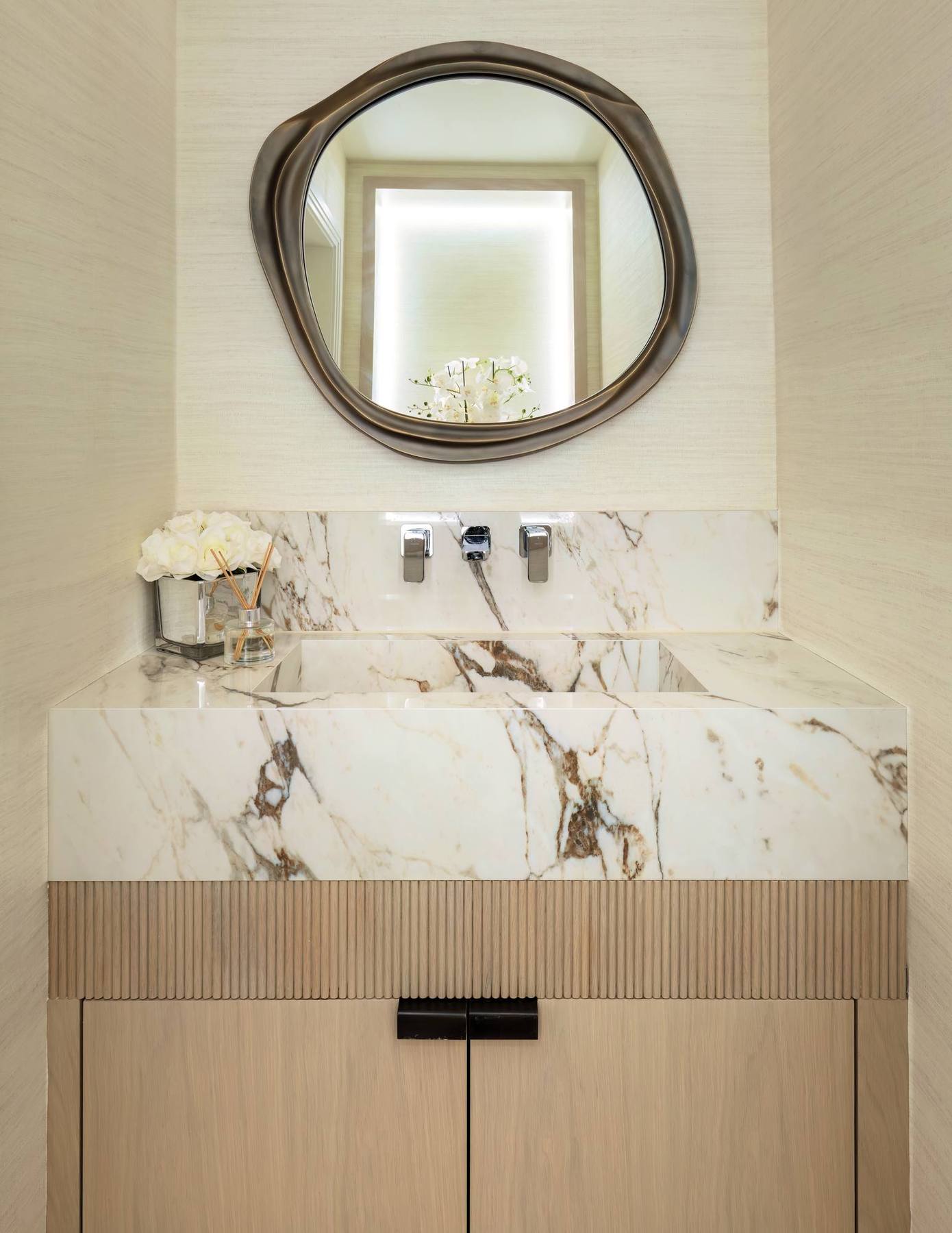 Marble sink and vanity mirror